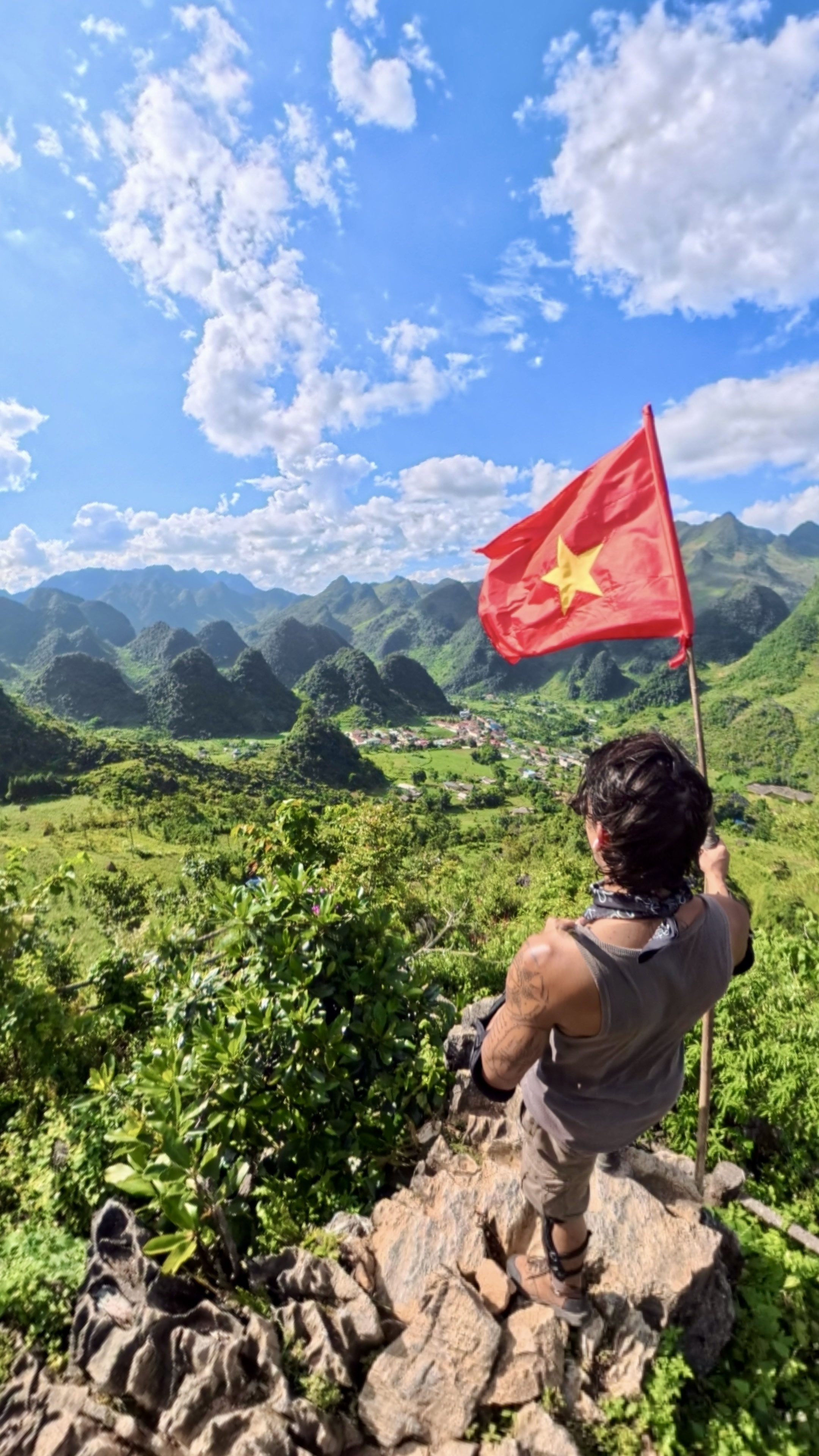 Ken with a flag in Vietnam